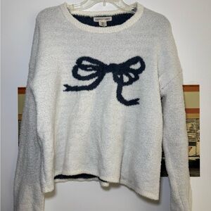 Women's Cream Sweater with Black Bow